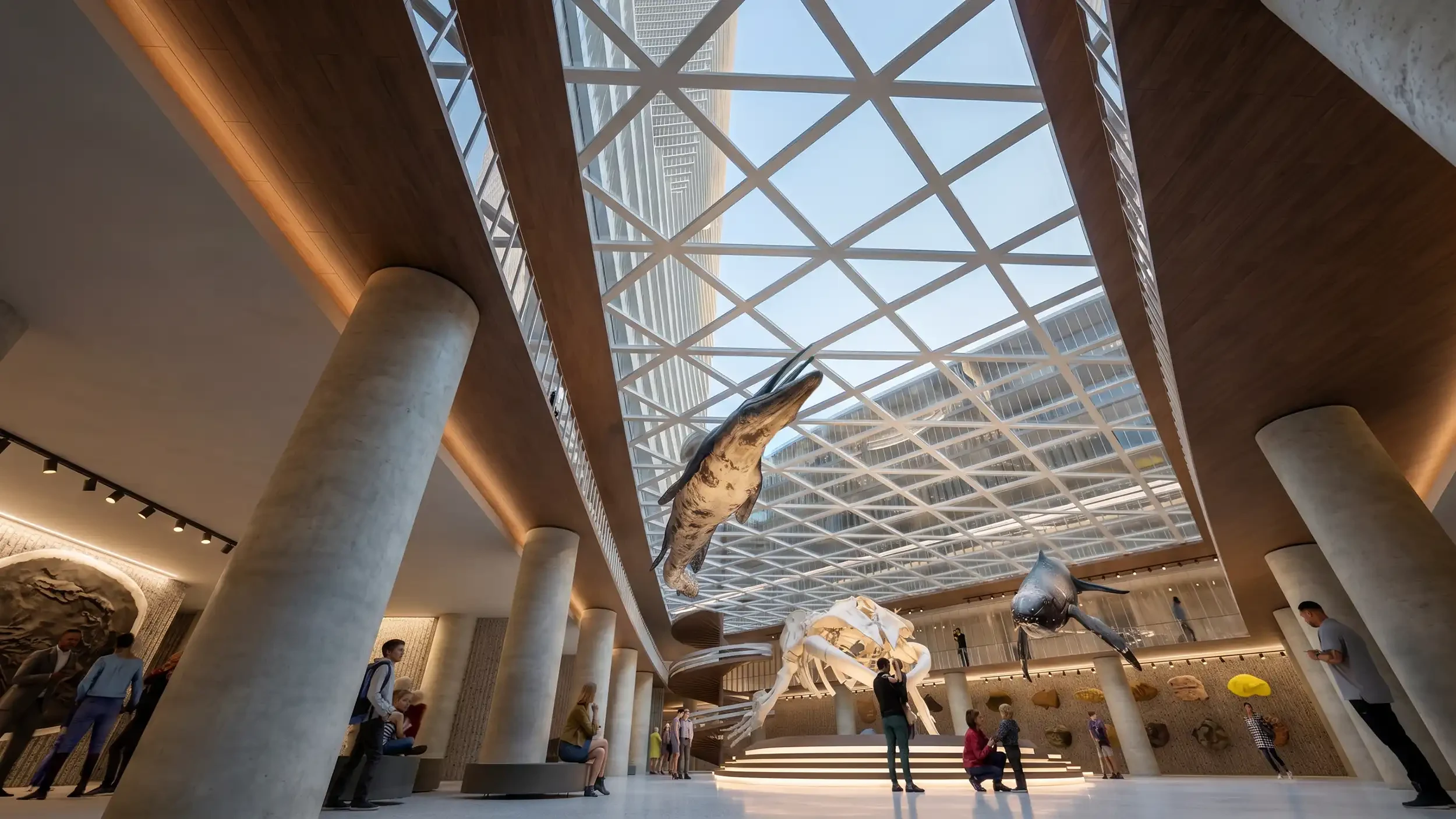 Atrium mit Glasdach, Betonstützen und schwebenden Ausstellungsstücken