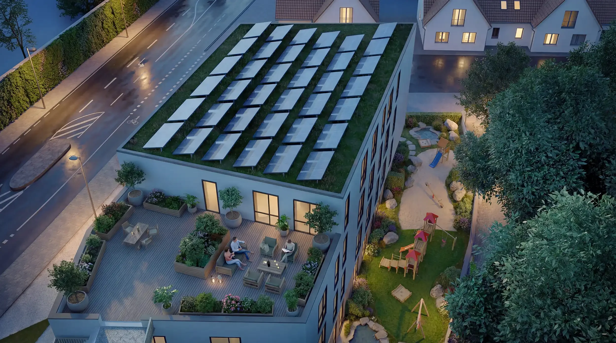 Dachterrasse am Abend mit Solaranlage und Spielplatz im Hof