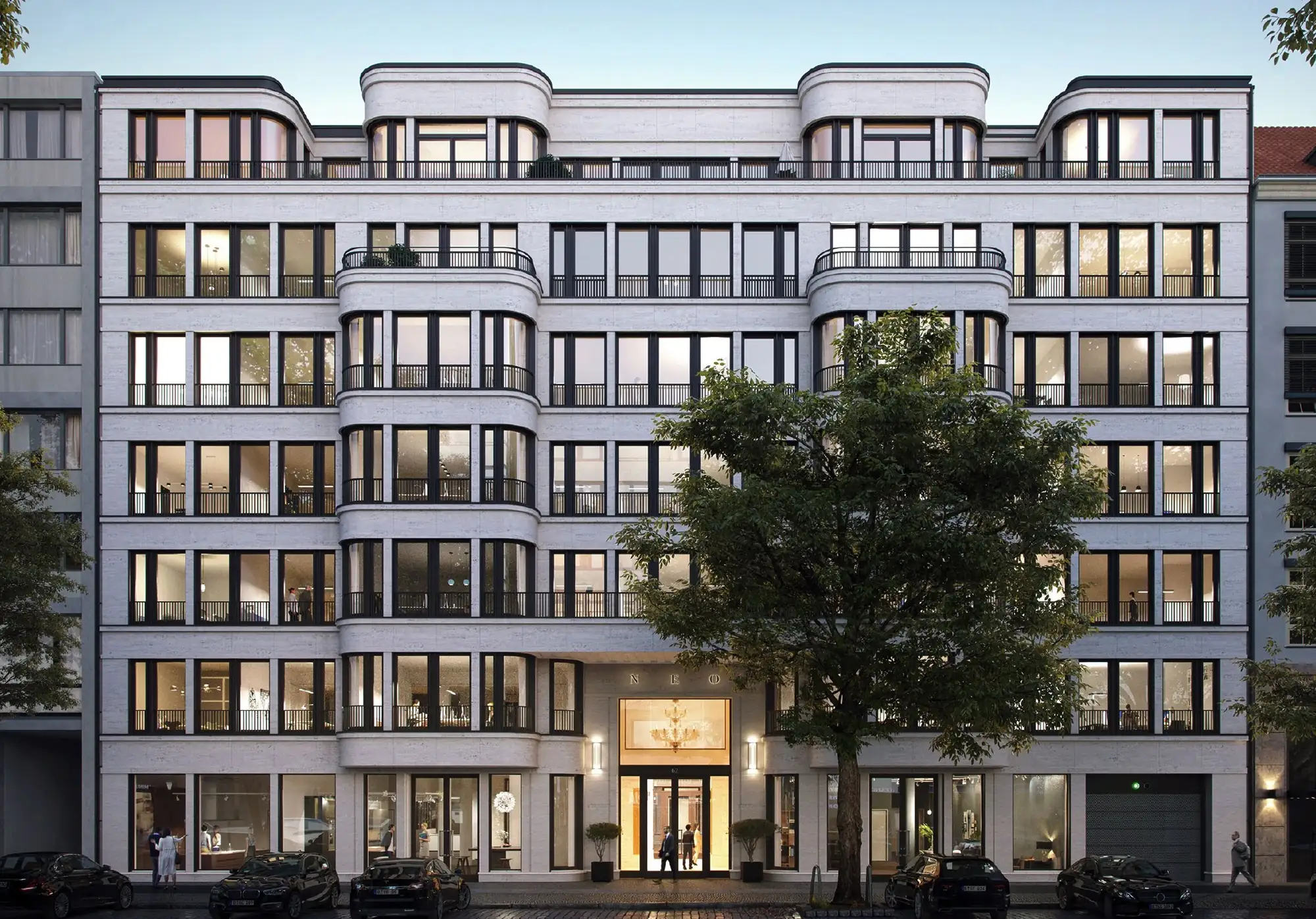 Straßenansicht des Bürohauses NEO am Abend